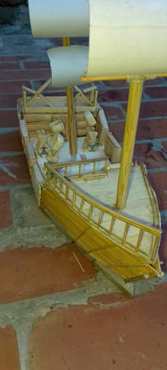 An ancient wooden ship model handmade for decoration and show piece