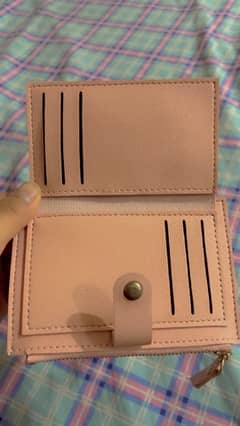 a cute pink new small wallet.