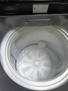Haier top load fully Automatic washing machine.