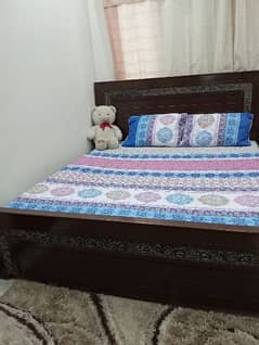 King size bed with 2 said table good condition