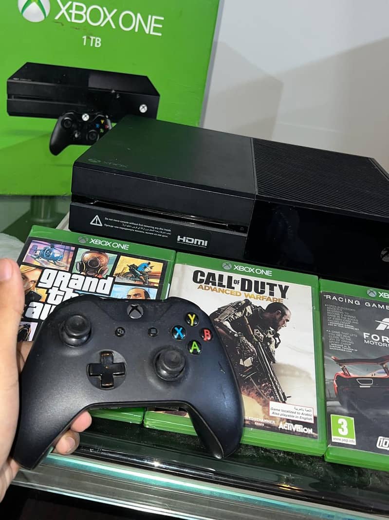 Xbox One 1TB with 2 controllers and games 4