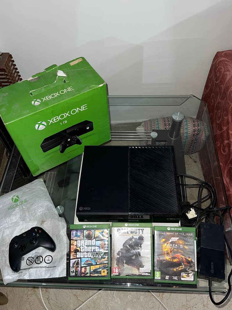 Xbox One 1TB with 2 controllers and games 8