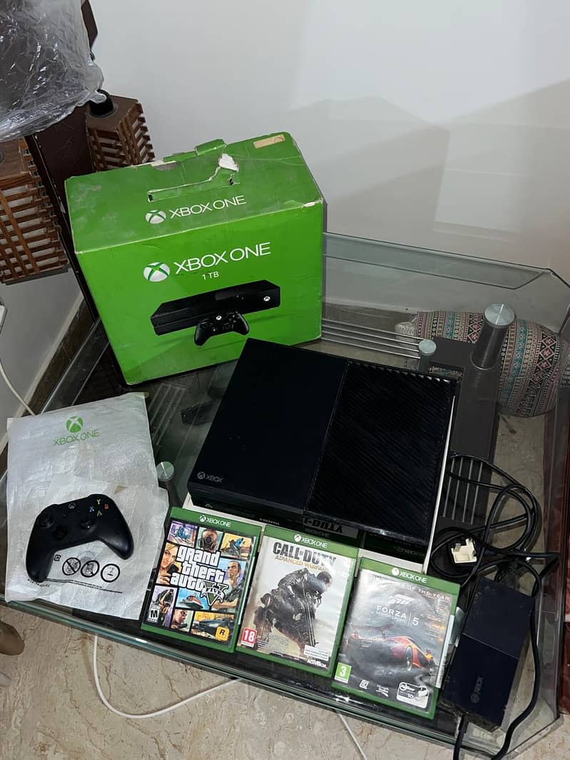 Xbox One 1TB with 2 controllers and games 9