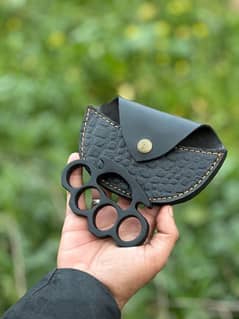 Custom handmade black Coated knuckle with awesome leather sheath