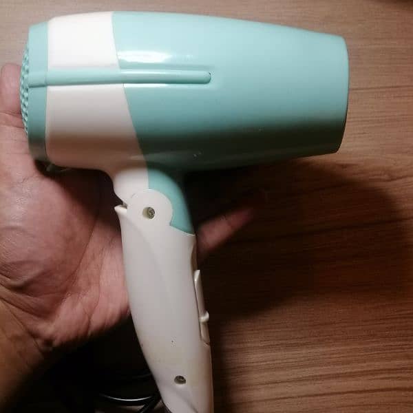 KEMEI Portable hair drayer with nozel at reasonable price 4