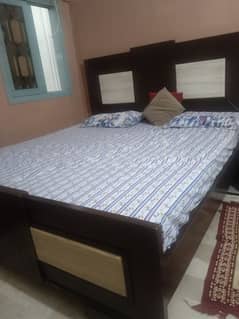 king size bed and 2 side tables