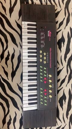 Miles electic keyboard piani for sale