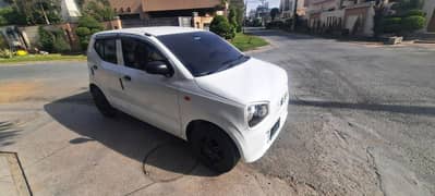 Suzuki Alto VXR white colour.