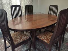 6 seater wooden dining table with 6 chair in Good condition