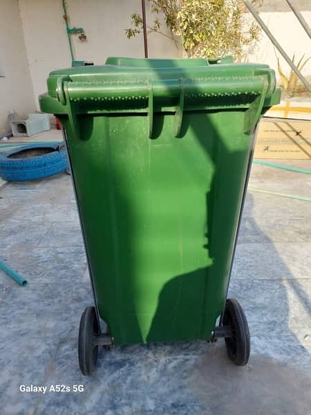 big green plastic dustbin 1