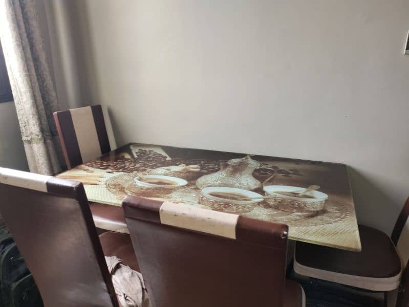 Stylish Coffee-Themed Dining Table with 4 Chairs - Used 0