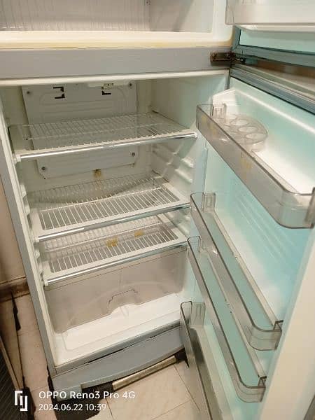 Medium size Dawlance refrigerator 10 by 9 condition ha 2