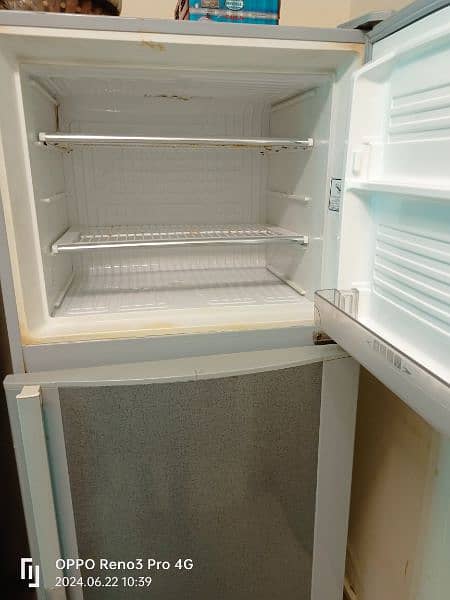 Medium size Dawlance refrigerator 10 by 9 condition ha 3