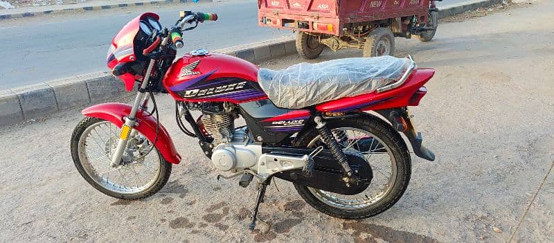 Honda deluxe 125 like new condition 5gears 1