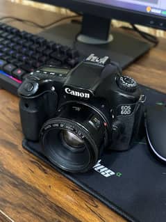 Canon 60D DSLR & Canon 50 mm f 1.8 Lens Original Box piece.