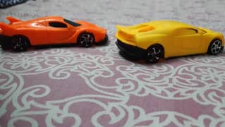 2 plastic cars