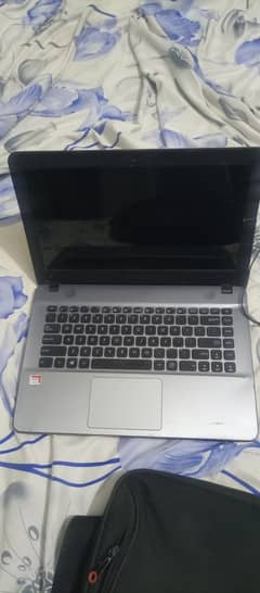 Laptop for sale. Not working but all original parts inside