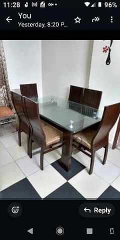 6 chairs dining table with free center carpet. .