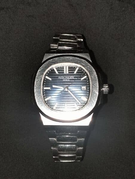 " Patek Philippe Nautilus Watch - Authentic, Mint Condition, Geneva" 1
