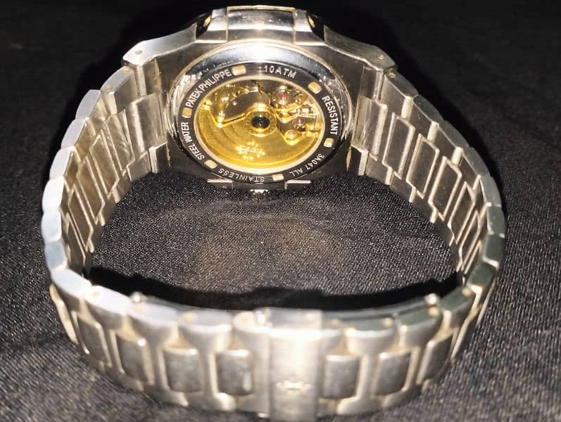 " Patek Philippe Nautilus Watch - Authentic, Mint Condition, Geneva" 4