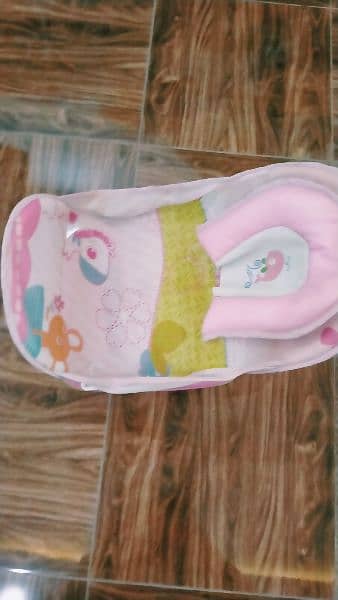 baby bather good condition. pink colour 1