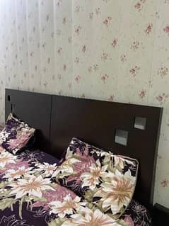 2 single bed with side tables .