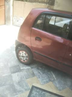 Hyundai Santro club 2003 efi better than Mehran cults alto coure