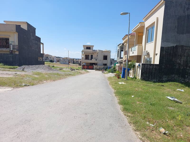 10 Marla Prime Plot for Sale in Umer Block - Ideal Location with Open Back and Level Ground! 0