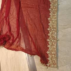 Stunning Maroon Bridal Lehenga with Exquisite Golden Embroidery