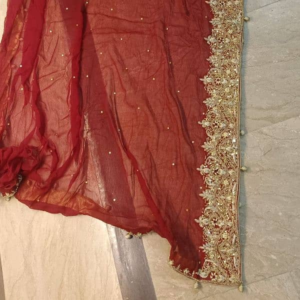 Stunning Maroon Bridal Lehenga with Exquisite Golden Embroidery 0