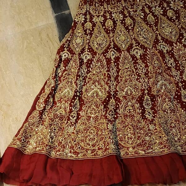 Stunning Maroon Bridal Lehenga with Exquisite Golden Embroidery 3