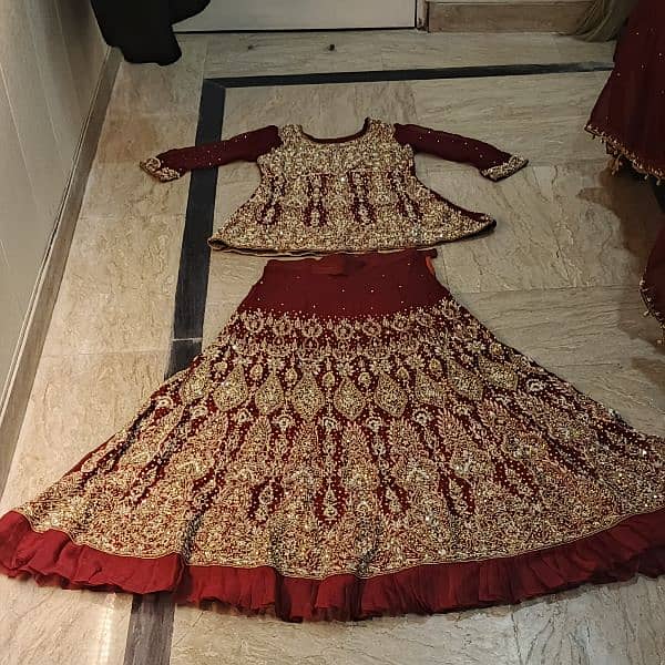 Stunning Maroon Bridal Lehenga with Exquisite Golden Embroidery 4
