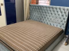 Light blue cushion bed
