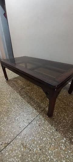 Center table , good condition ,black glass, used