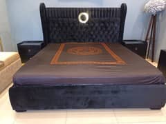 Bed with two sidetables