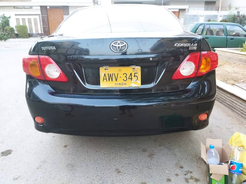 Toyota Corolla XLI 2011 Black petrol driven neat and clean 1