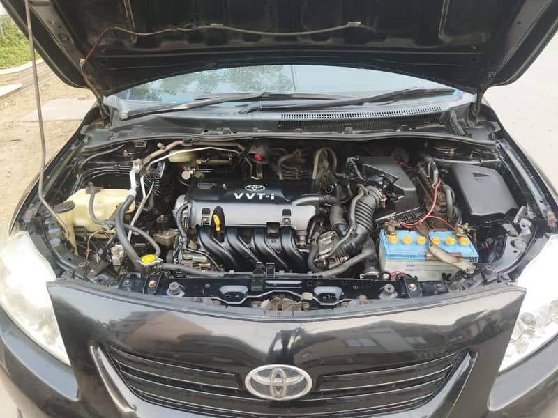 Toyota Corolla XLI 2011 Black petrol driven neat and clean 2