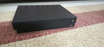 Xbox One X 1TB with 4 games , one original controller .