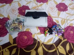 Xbox with two controllers and Kinect with box