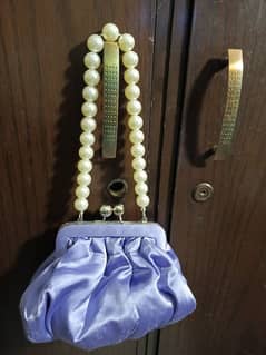 Pearl hand bag