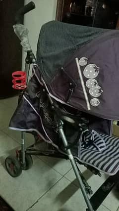 tinnies baby stroller with trolley and basket in dark purple colors