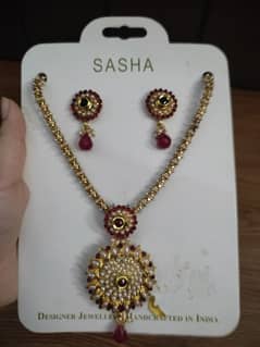 branded SASHA jewellery set