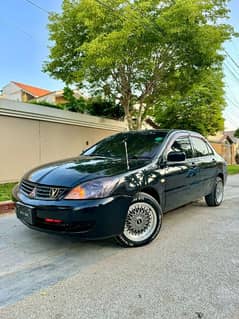 Mitsubishi Lancer 2006 /12 own engine better civic city corolla liana 0