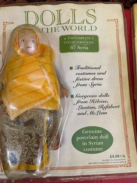 International Porcelain Made Dolls, Set of 7 5