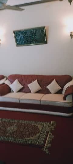 5 seater sofa in good condition with glass maze of matching
