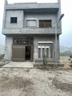 3 Marla Decent Style House Is Available For Sale On Installment Plan On GT Road Manawan Lahore.