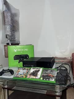 Xbox one 1TB 10/10 condition with 2 controllers and games