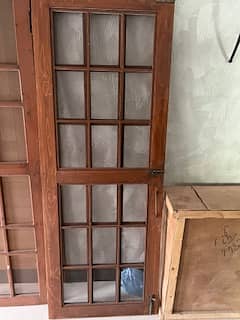 Wooden net door with iron rod