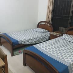 2 single beds with mattreses
