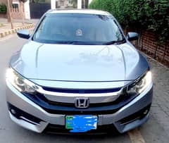 Honda civic vti oriel full option